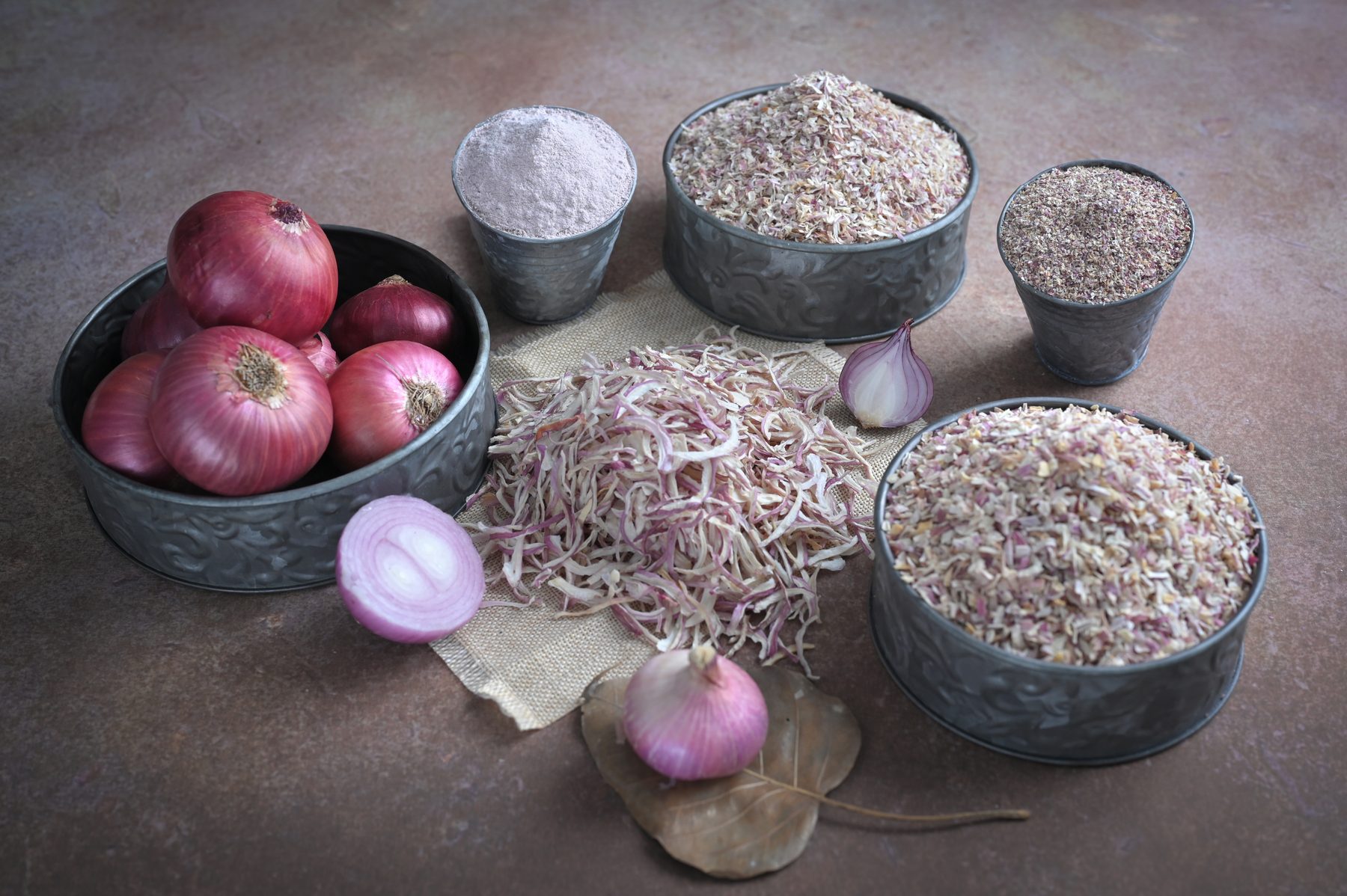 Pink onion products in multiple dehydrated formats